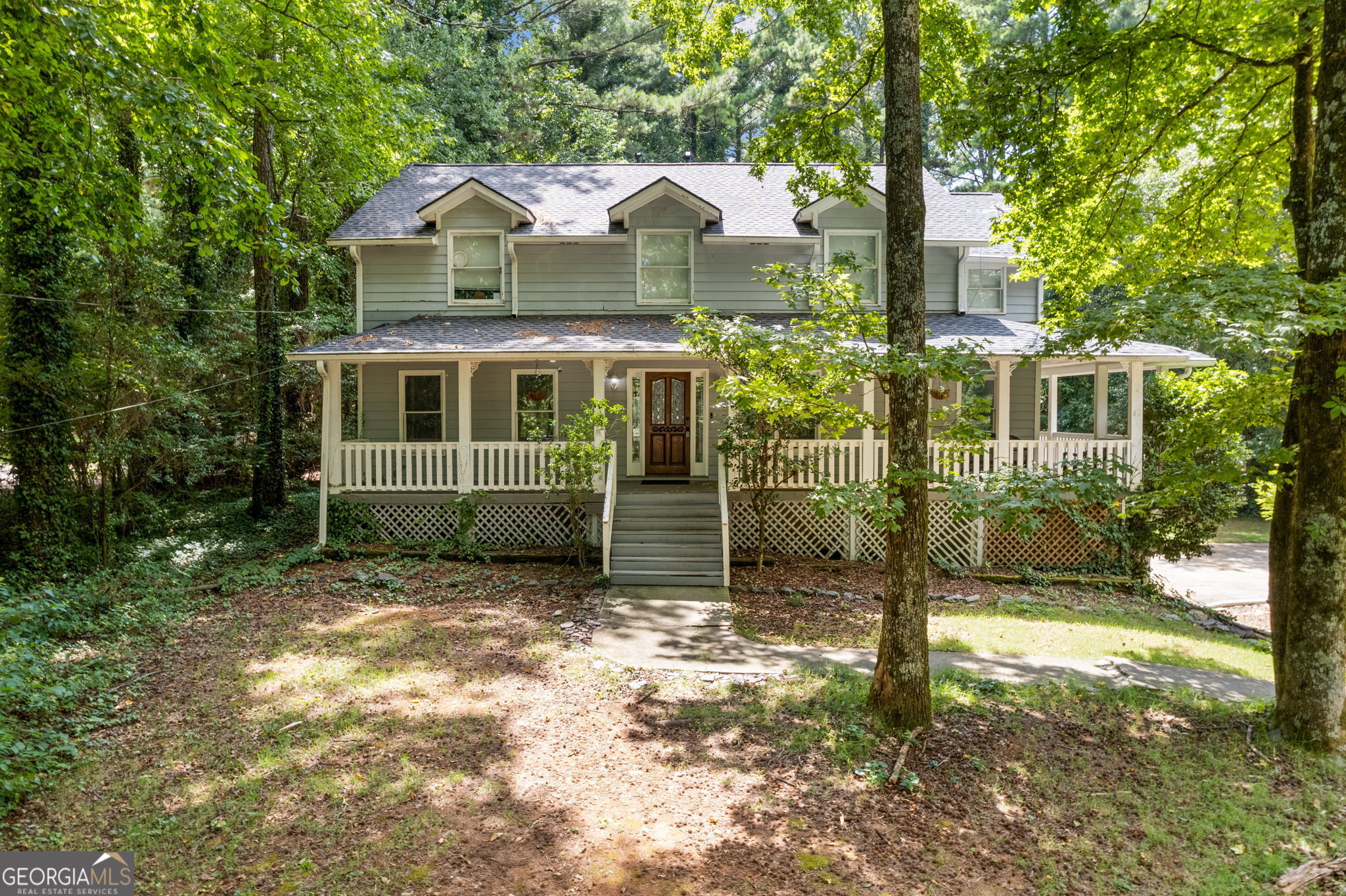 Step into modern charm and timeless elegance in this beautifully renovated 5-bedroom, 3.5-bath home nestled in a tranquil, sought-after community. From the welcoming wraparound porch with newly painted railings to the spacious interior, every detail has been thoughtfully upgraded. Highlights include: - Brand-new roof for worry-free living - Stylish, updated kitchen with new appliances and sleek finishes - Renovated bathrooms with contemporary touches - Generously sized bedrooms offering comfort and flexibility - Versatile basement level with additional bedroom or office space - Expansive, private backyard-perfect for relaxing or entertaining Located just minutes from Stone Mountain Park and key highways, enjoy both convenience and serenity in one perfect package.