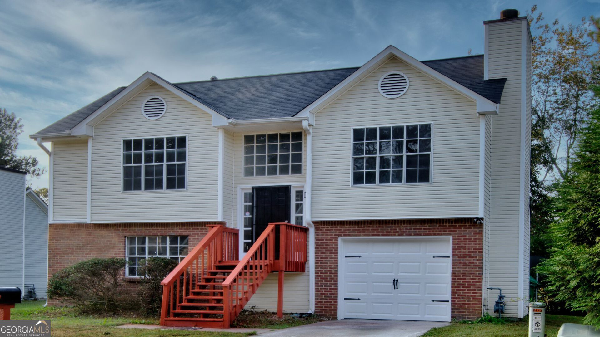 Step into this attractive split-level move-in READY home. The kitchen has been immaculately renovated, with marble countertops, freshly painted, new carpet, updated bathrooms, and much more. The living room is equipped with a fireplace, perfect for chilly nights. The backyard offers a nice deck, perfect for outdoor entertaining. The flexible living space includes other rooms on the lower level. Don't miss your chance to make this house your home!
