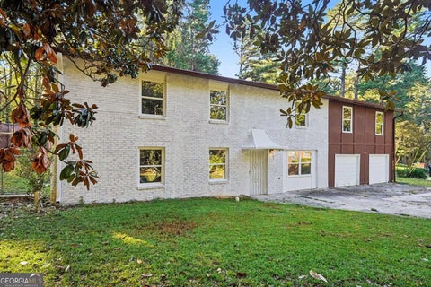 Photo of 2830 Allegro Dr NW, Atlanta, GA 30318 (MLS # 10870091)