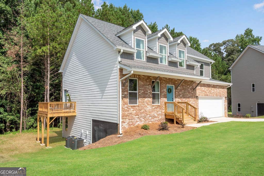 Photo of 3408 Ashford Loop, Ellenwood, GA 30294 (MLS # 10832793)