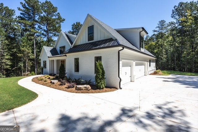 GORGEOUS NEW CONSTRUCTION home in the prestigious gated subdivision, River Forest. This community offers 2 pools, tennis courts, clubhouse, gym, championship golf course and so much more! Nestled in a quiet cul-de-sac, this home is sure to check all your boxes. The primary and guest suite are on the main floor, along with a gourmet kitchen, walk-in pantry and upgraded appliances. Outside you will find a beautiful covered patio and fireplace to unwind. Upstairs, there are 2 additional bedrooms and a spacious bonus room that can be used as a 5th bedroom. The house plans have been modified to have a 3 car garage, instead of 2. Also, a full bathroom has been added on to the bonus room . Measurements are estimated. Please remeasure if concerned. Call today for a private showing.