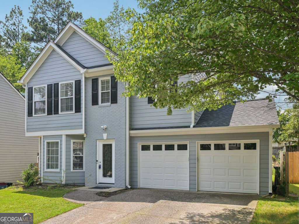 Tucked away on a quiet cul-de-sac in Henderson Village, this freshly updated home blends smart upgrades with a truly convenient location, just minutes from Downtown Alpharetta and The Avalon. Inside, you'll find a bright, welcoming layout with three bedrooms and two and a half bathrooms. The kitchen has been completely renovated with all-new appliances, updated finishes, and a clean, modern look. Bathrooms have also been refreshed, offering a polished, move-in-ready feel. Fresh paint inside and out, new flooring throughout, and upgraded window blinds keep the interiors looking sharp and current. Outside, the improvements continue: Hardiplank siding, new gutters, roof, AC, and ductwork take care of the big-ticket items. New garage doors and updated front and rear entry doors bring peace of mind and curb appeal. In the backyard, 19 pine trees have been cleared to open up the space, fully fenced and ready for everything from pets to play. As part of Henderson Village, residents enjoy swim and tennis facilities, a clubhouse, and a fitness center. If you're looking for low-maintenance living with community perks and easy access to Alpharetta's top spots, this home checks all the boxes.