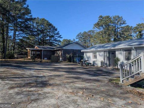 Photo of 4628 Tucson Trail SW, Atlanta, GA 30331 (MLS # 10670978)