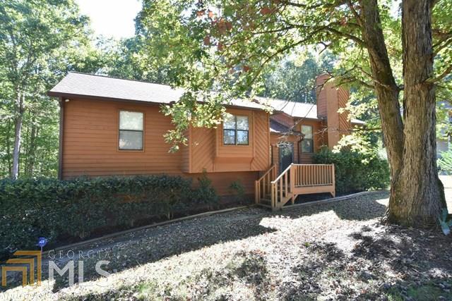 Wow! So much room for the money! Ranch with full basement! Split foyer entry leads inside to hardwood, oversized family room with vaulted ceilings and fireplace. Spacious dining room with more hardwoods is right off kitchen. Skylights thoughout, 3 bedrooms, 2 baths on main level, plus a FULL BASEMENT! 1 good sized finished room, half bath, drive under garage with Room for all your toys and hobbys. Back deck leads to large, level fenced yard, lots of room to play or build your dream outdoor living space. Great neighborhood, room between neighbors.