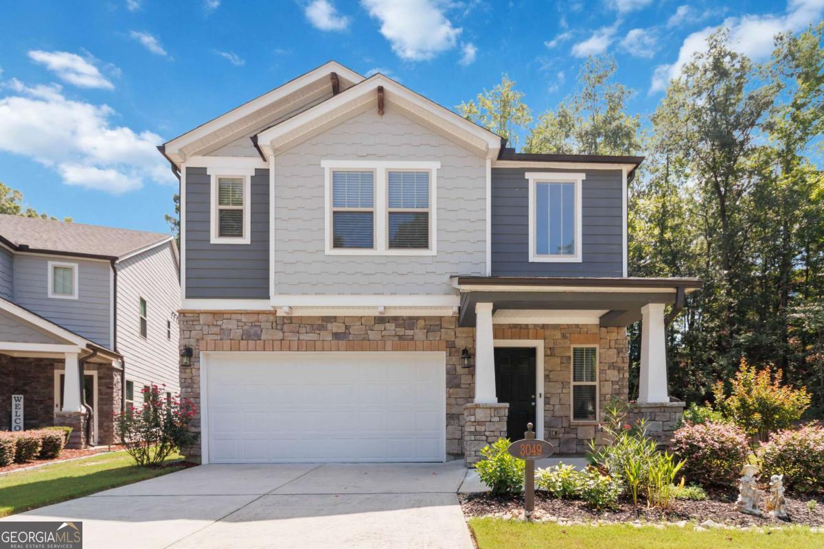 Don't wait on new construction and move into this well-maintained, newer construction home, tucked back on a private, wooded, cul-de-sac lot today! Zero carpet on the main level with gleaming engineered hardwoods! Opening and inviting dining, living room and kitchen area offering the perfect gathering and entertaining space! Cook to your culinary heart's desire in the beautiful, spacious, sleek kitchen with a MASSIVE island! Unwind outdoors in the private, wooded, low maintenance backyard! Additional recreational/lounging space available with the upper level bonus/flex space! Great primary bedroom with beautiful natural light, ensuite and large walk-in closet! Nicely sized secondary bedrooms and hall bathroom with double vanities! Unbeatable location with convenient access to I-85 and under 10 minutes from all of the shopping, dining, amenities and entertainment the Mall of Georgia and Exchange areas have to offer!