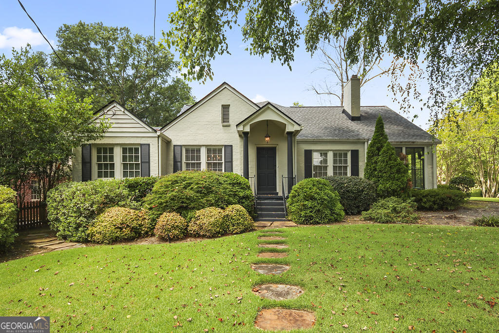 A beautiful leasing opportunity at 2880 Alpine Drive, an exceptional 3-bedroom, 3-bathroom brick home ideally situated in the heart of Atlanta's highly sought-after Peachtree Heights/Garden Hills neighborhood. Tucked away on a beautifully landscaped lot, this home offers timeless curb appeal with a welcoming front walkway, charming covered porch, and a classic painted brick exterior. Step inside to find light-filled living spaces, hardwood floors, and a thoughtfully updated interior that blends elegance with functionality. The gourmet kitchen features shaker cabinetry, stainless steel appliances, a center island with seating, and a walk-in pantry, opening into a spacious living room with a fireplace - ideal for both entertaining and everyday living. The generous upstairs primary suite is a true retreat, complete with vaulted ceilings, a large arched window, fireplace seating area, and a spa-inspired ensuite bath. Two additional bedrooms on the main floor are complemented by a beautifully finished bonus room and a bright sunroom that makes a perfect home office or play space. Outside, enjoy a private covered patio with ceiling fans and a large carport with additional storage. Located in the desirable Garden Hills Elementary and Sutton Middle school districts, and minutes from Atlanta International School (AIS), this home is perfect if you are seeking top-tier education options. Walk to nearby Buckhead Village District for some of Atlanta's best dining, shopping, and local events, or enjoy weekends at Frankie Allen Park just around the corner. Don't miss this rare opportunity to rent a turnkey home in one of Atlanta's most prestigious and walkable neighborhoods.