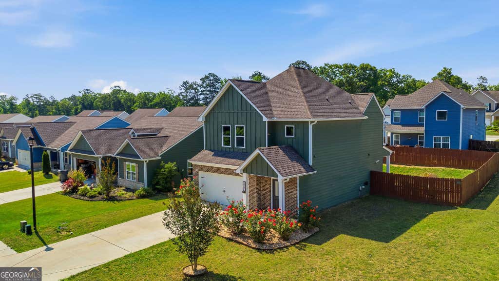 Photo of 126 Charleston Lane, Milner, GA 30257 (MLS # 10805099)