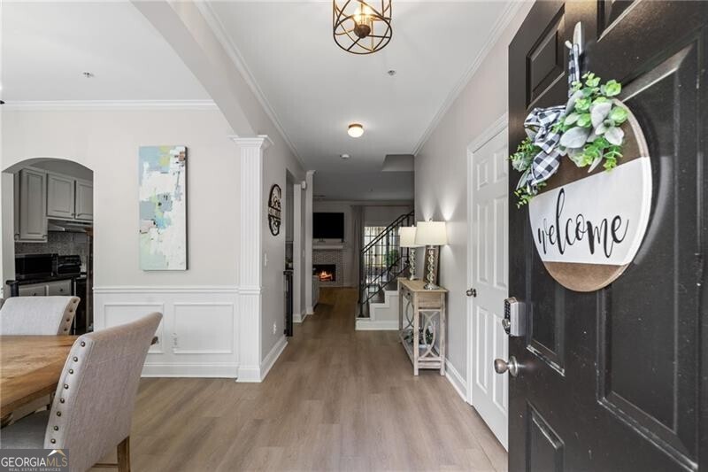 Don't walk, run! Buyer terminated at no fault of the seller AND only 2 days on the market. I am sure you missed it! You will not want to miss it this time. Schedule your showing today. Location is at your fingertips. This 2 bedroom, 2 1/2 bathroom updated townhome is just minutes away from Downtown Alpharetta, Avalon, Crabapple, Wills Park and GA400. Tucked inside a serene, gated community, this beauty offers more than just a place to live-it's your personal sanctuary. You can save money and be close to everything all of Metro Atlanta is talking about. Your family will thank you, your dog will thank you and so will your BFF. Step inside to discover a bright open floor plan that instantly feels like home and flows seamlessly into a dedicated dining space. The kitchen with modern cabinets, a pantry and LVP throughout overlooks a huge living room that flows right over into your very own private courtyard back deck. Slide open the back doors and find your own private escape: a private fenced deck ideal for sipping your morning coffee, soaking up the sun, or letting the dogs out while you are still in your PJ's. It's open, it's peaceful, and it's all yours. Low-maintenance living. This townhome offers everything a Condominium offers with the look and privacy of a townhome. The HOA covers water, trash, exterior maintenance, lawn, roof, and termite protection-you can spend more time doing what you love and less time on upkeep. All while feeling safe and secure with a gate at the front entrance. Have you had trouble securing insurance for condominiums in the past? No need to worry-this association is fully insured and meets the requirements for loan qualification. All of this for under $400k. This is a dream. Offered at $364,999, this isn't just a townhome-it's a lifestyle. A fresh chapter in a vibrant community, surrounded by everything Alpharetta has to offer. You do not want to miss this showstopper townhome with all Alpharetta has to offer. Schedule your showing today before its gone.