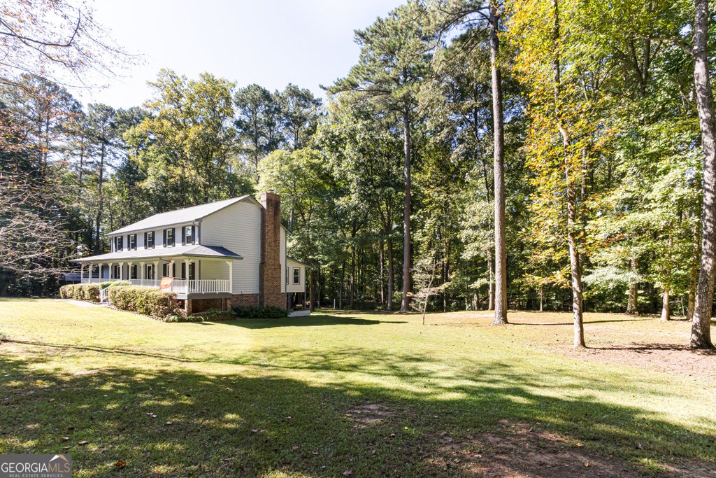 Photo of 3308 Wilderness Drive, Powder Springs, GA 30127 (MLS # 10878655)