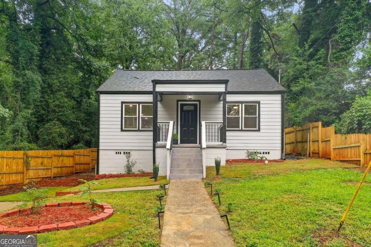 LOCATION!LOCATTION! LOCATION! Welcome to your dream home in one of Atlanta's most vibrant and sought after neighborhoods - Kirkwood! This beautifully renovated 3-Bedroom, 2-Bath gem combines modern upgrades with timeless charm. The open concept living space is perfect for entertaining or simply relaxing after a hard day. The fully updated kitchen features sleek countertops, stainless steel appliances and stylish finishes that will inspire your inner chef. The spacious primary suite is a serene retreat with access to the spacious patio overlooking a backyard oasis, perfect for cookouts and entertaining or just enjoying a cup of coffee. The property's ideal location in the Kirkwood area allows for easy access to the surrounding community amenities such as the Candler Golf Course, the East Lake Family YMCA, and Interstate 20. Come see Today...Come stay Forever!
