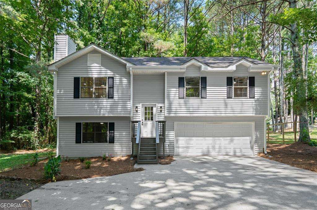 4.75% Interest Rate for a limited time! Or receive $9500 in closing costs! Welcome Home ATL to 3646 Lenora Church Road, a turnkey gem in the heart of Snellville. This updated home features hardwood floors, abundant natural light, and a bright kitchen with recently upgraded appliances. The spacious layout includes refreshed baths, sizable bedrooms, and a large, level backyard perfect for entertaining or relaxing. A two-car garage adds everyday convenience. With its move-in ready condition and unbeatable location near schools, parks, and shopping, this home is a smart choice for today's buyer.