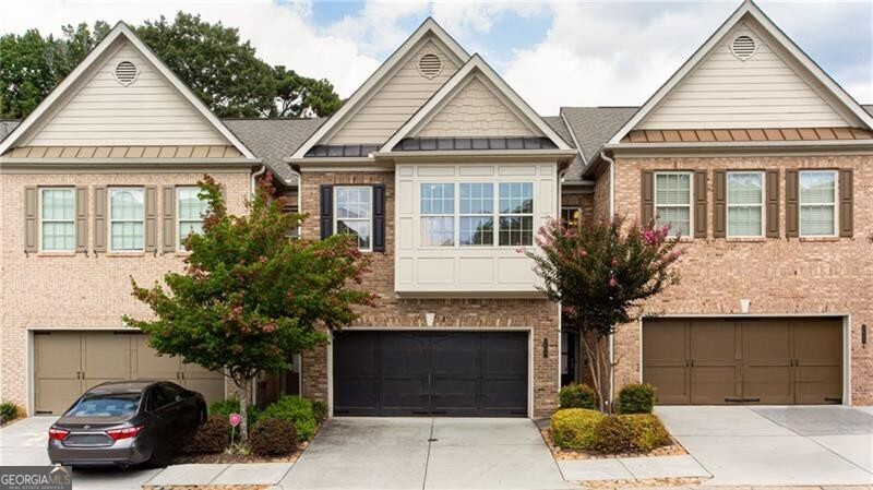 Welcome to convenient city living. Beautiful 2 bed/3 bathroom upscale townhome located right off HWY 285 in a well maintained subdivision. This is the perfect home for someone who values elegant finishes, tall soaring ceilings, and an open floor plan. You'll love cooking in the Chef's kitchen with it's oversized granite island, stainless steel gas appliances, and butlers pantry, all overlooking the living room. New Hard Wood floors downstairs that flow out to your own serene private back patio and fenced in yard. There is a powder room on the main floor for guests. Upstairs you'll find a very large loft area perfect for a office, and two huge bedrooms in a roommate floor plan, which means each bedroom is on separate sides of the home. Both bedrooms have new carpet and their own spacious spa bathroom with tile floors, double vanities, large soaking tubs, separate big showers and a true walk-in closet. The laundry room is conveniently located upstairs, which means no more carrying laundry upstairs! LOW fee simple HOA fee of $150/month includes underground utilities, street lamps, sidewalks, professional landscaping and maintenance of the roof and your homes exterior. This home has plenty of storage and counter space and has been freshly painted. Come see it today!