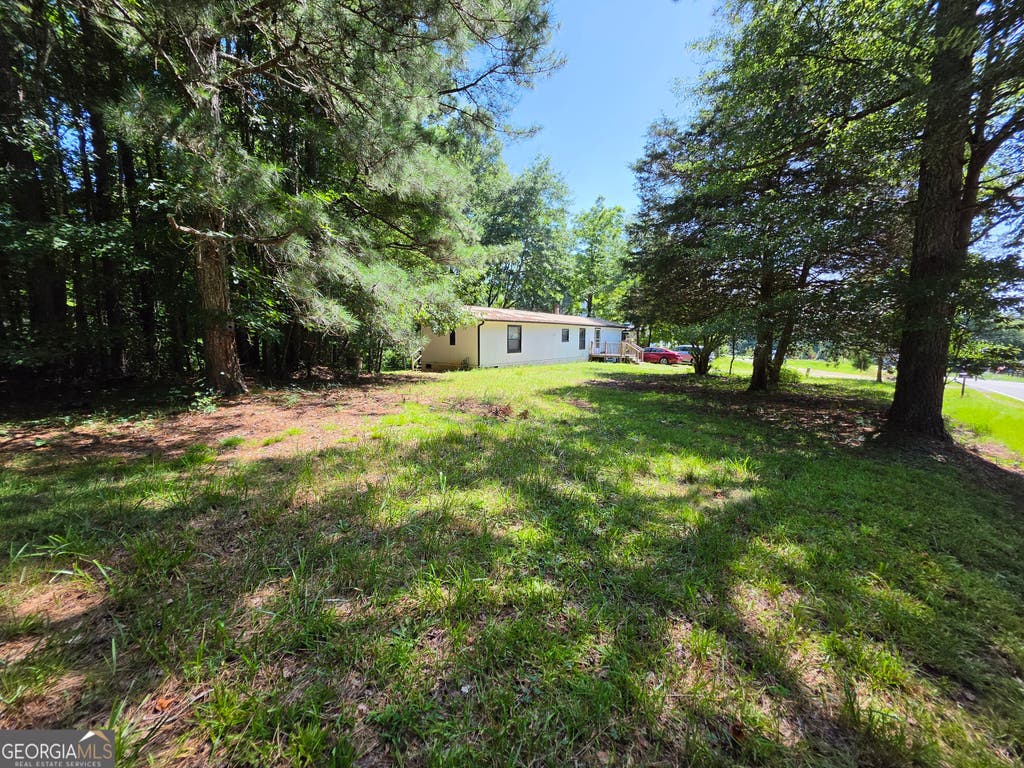 Photo of 5170 Hurt Bridge Road, Cumming, GA 30028 (MLS # 10817083)