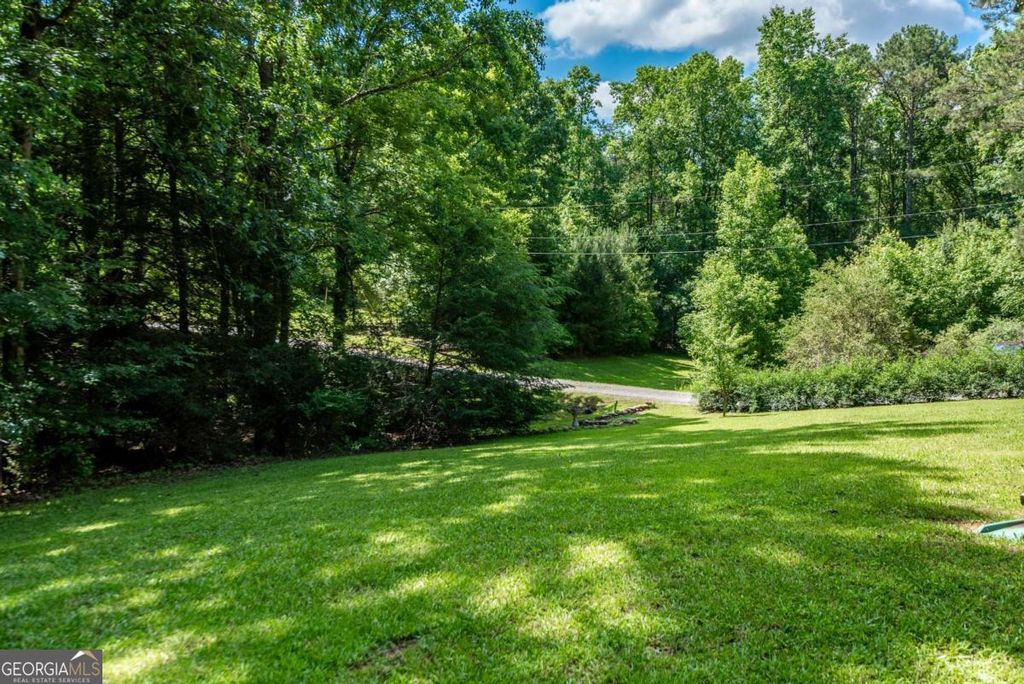 Photo of 410 N Sharp Mountain Church Lane, Ball Ground, GA 30107 (MLS # 10659737)