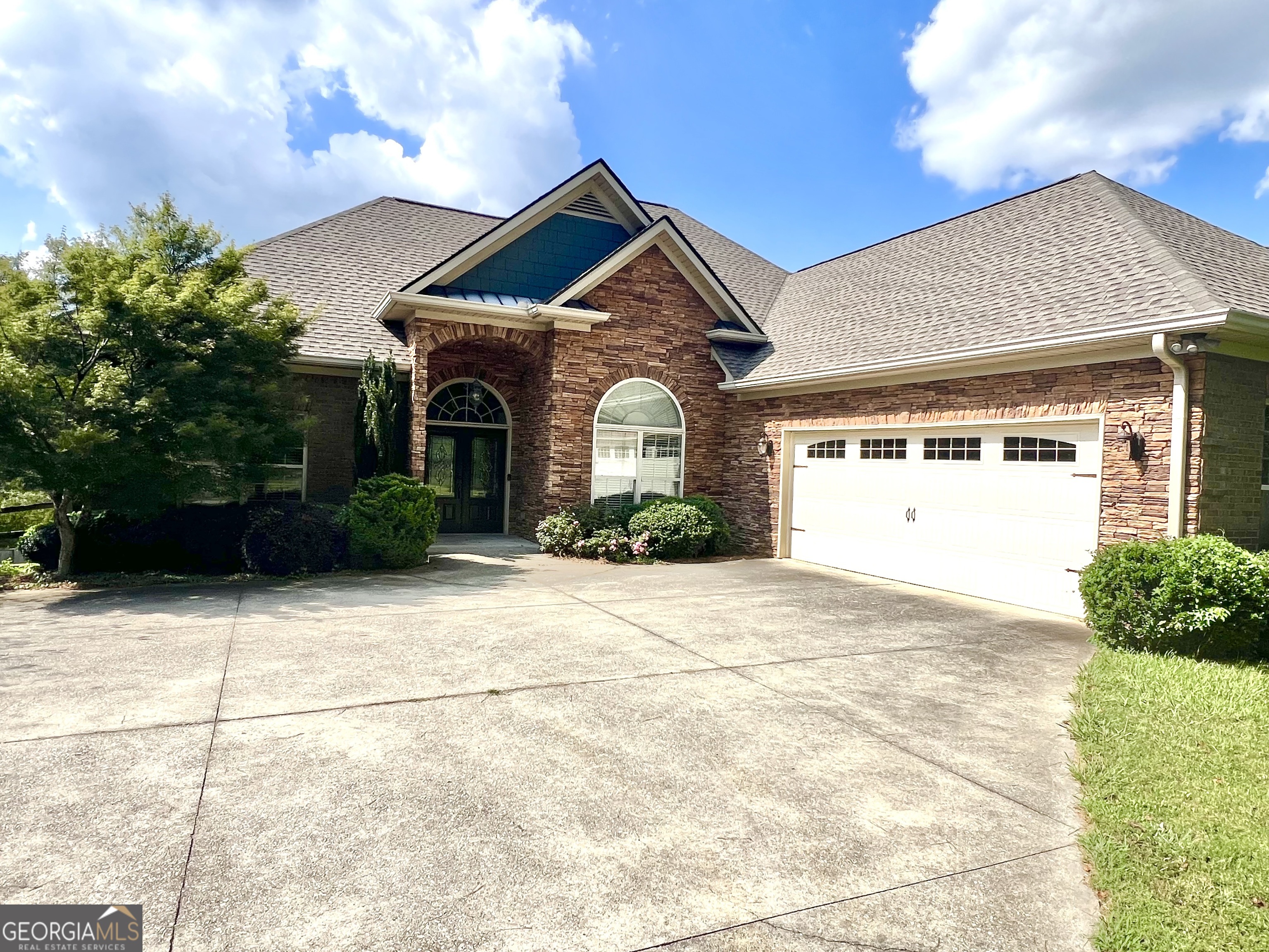 Step into this beautiful custom craftsman home on 1.67 acres with peaceful pasture views. This exquisite 4,417 square foot home features 4-bedrooms, 3.5-bathrooms. The master suite on the main level is a true retreat, featuring a luxurious en-suite bathroom with a soaking tub, separate shower, dual sinks, and large walk-in closet. This beautifully crafted home blends timeless design with modern upgrades, including a brand new roof and a spacious two-car garage that adds convenience and functionality. The main level also features a formal dining room, half bath, laundry room and two generously sized bedrooms and a full bath. Upstairs features the 4th bedroom with a spacious full bath. The large back deck and sun porch offer ideal spaces for relaxation and entertainment. A full unfinished basement with tall ceilings and a basement garage provides endless potential to transform it into the entertainment space of your dreams. Whether you choose to add a home gym, media room, or additional living space. Plumbed for a future second kitchen and a bathroom. With quality craftsmanship, elegant details, and the added value of a brand new roof and generous garage space, this home is truly a must-see! Schedule your private showing today!