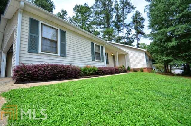 A COZY RANCH ON A SPACIOUS CORNER LOT WITH A FENCED PRIVATE BACKYARD, IN AN ESTABLISHED NEIGHBORHOOD IN THE BROOKWOOD SCHOOL DISTRICT. CONVENIENT TO I-285, STONE MOUNTAIN FREEWAY, AND I-85. TWO CAR GARAGE AND A COVERED PATIO. INSIDE IT FEATURES GLEAMING HARDWOOD FLOORS AND A FIREPLACE IN LIVING ROOM, WALLNUT CABINETS AND BLACK APPLIANCES IN KITCHEN, WALK IN CLOSETS IN MASTER.