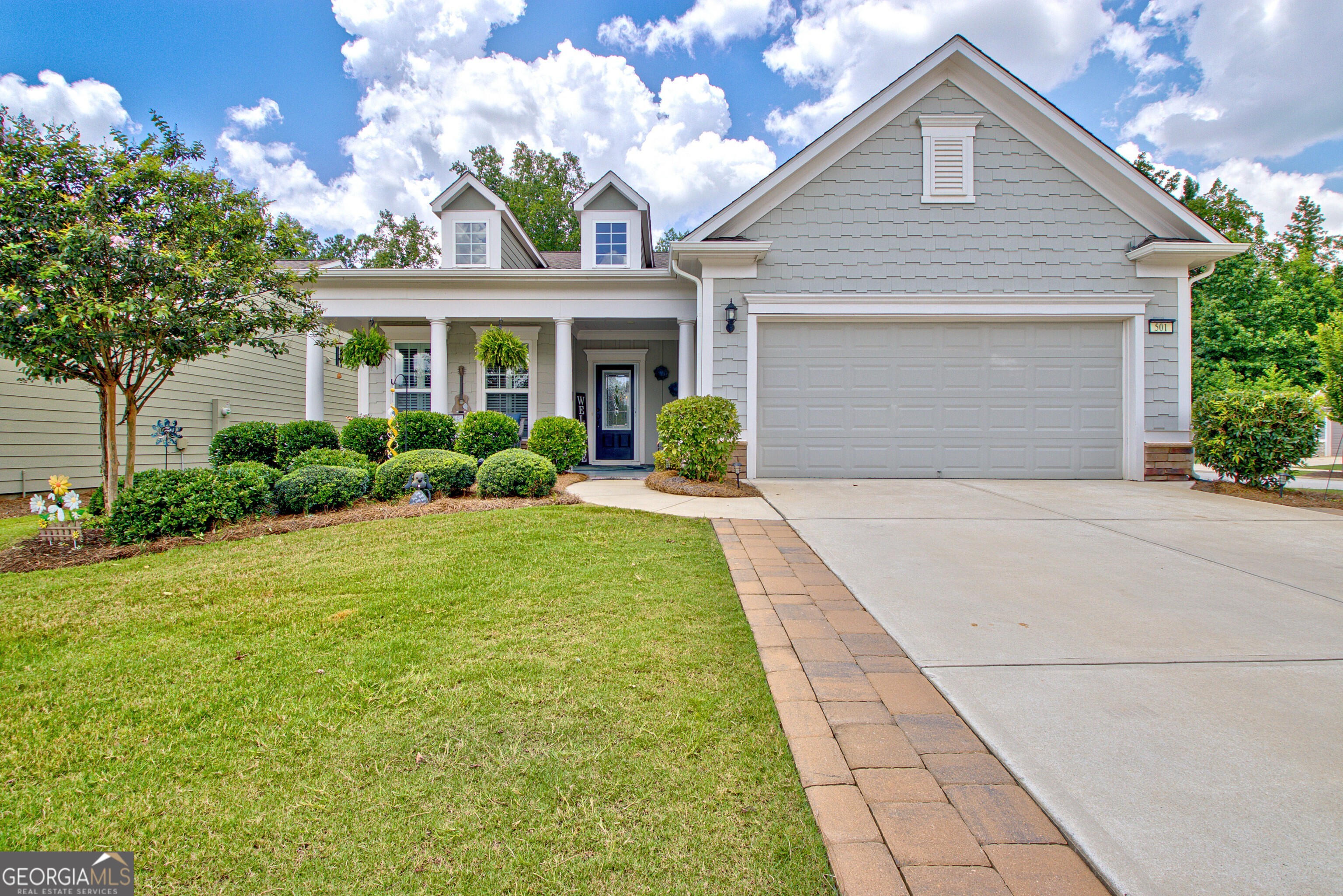 Stop the Car! This Fantastic and sought after Martin Ray is Beautifully Maintained Built in 2019. 2 Bedrooms / 2 Baths. With Custom closet in Master bedroom. Tiled wall in Master Bathroom and Toilet closet. Plantation Shutters with darkening Blind in the Master. Cabinets in Laundry Room. Tiled Wall in Den. Custom Rock Fireplace. Upgraded Fixtures throughout the House. Upgraded Pantry, Decorative Door, Soft Close Drawers/Cabinets. Lifted Dishwasher, Decorative tile above the range. Drop Zone by the Garage Door. Garage Floor is Epoxy. Pavers have been added by the Driveway for more width. Tiled Front Porch and back Patio. Fenced in Backyard. As I stated before this Home is Fantastic! All this in a wonderful Community where you will never be without something to do to keep you entertained.