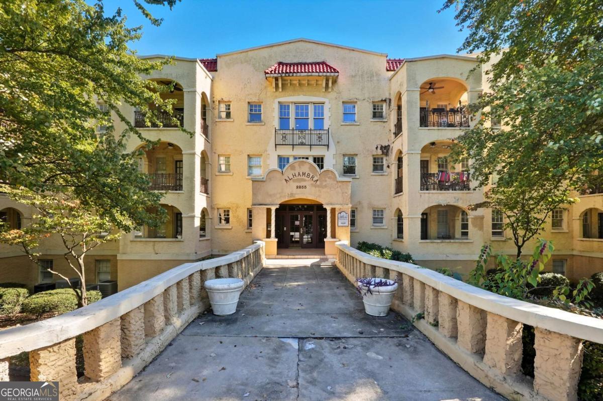 Welcome to Buckhead's best kept secret "Alhambra". Amazing opportunity to own a piece of history in the heart of Buckhead! Live, work and play in the midst of vibrant city life! Walkable to Publix, Starbucks, Fetch Park and the amazing shopping & dining in Buckhead Village! Within close proximity to Shops of Buckhead, casual and fine dining, parks and public transportation. Located in sought after school district! 2 bd/2.5 baths condominium featuring spacious kitchen overlooking family room, large master bedroom, gorgeous hardwood flooring & granite countertops. Open floor plan perfect for entertaining. One assigned parking space. Laundry room on main level. Washer Dryer included! Prestigious Garden Hills is right behind the block. Lenox and Midtown are easily accessible, and so is Marta - train station. Registered as a historic building.
