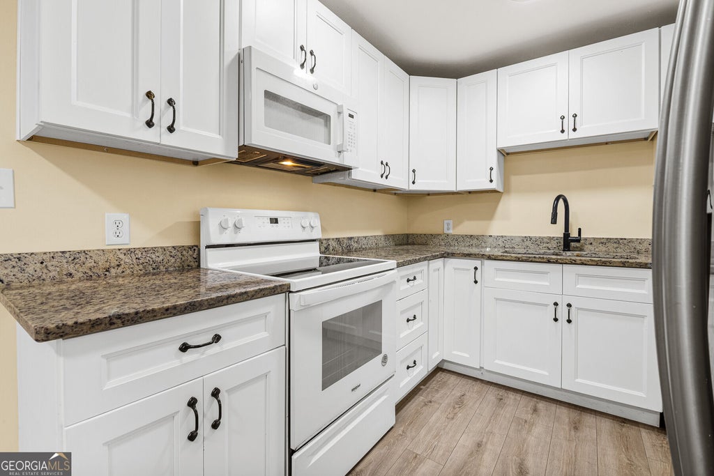 Photo of 349 Roxbury Dr, Riverdale, GA 30274 (MLS # 10868876)