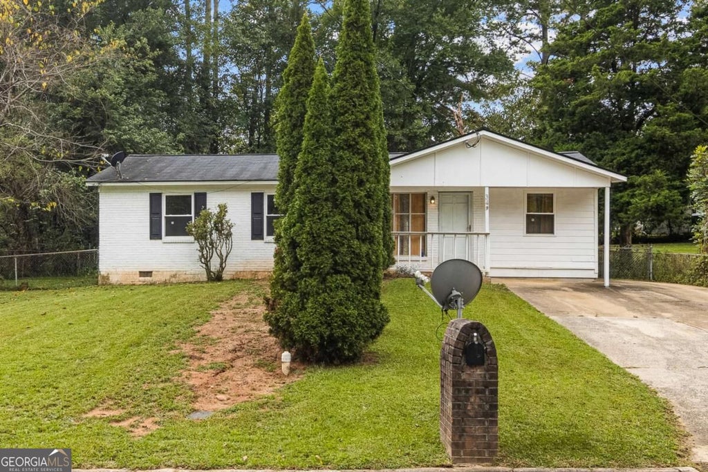 Photo of 349 Roxbury Dr, Riverdale, GA 30274 (MLS # 10868876)