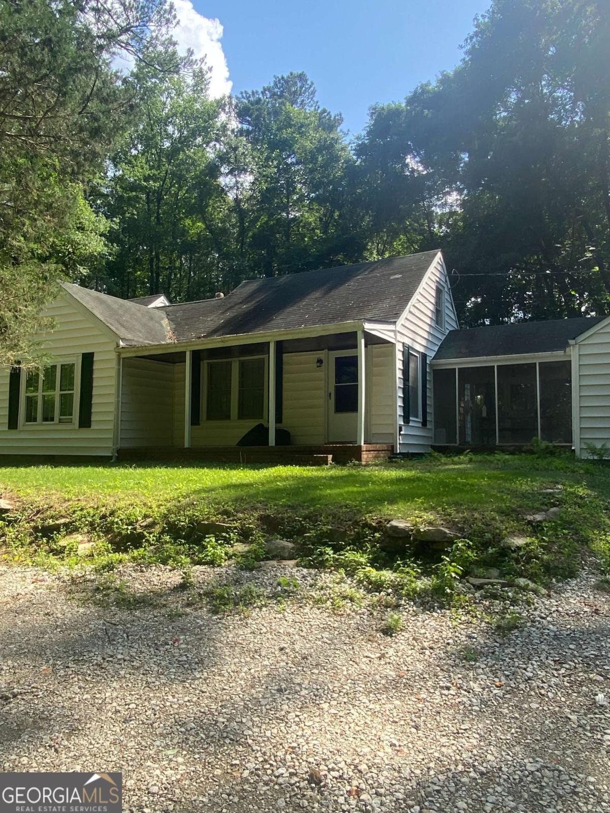 Investors delight! Tear down, fix, and flip, and build more. Builders, bring your vision and floor plans. Great established neighborhood. This is a desirable and buildable lot. House with 3.8+ wooded and cleared acres. This As-Is property offers 700 feet of frontage on King Rd. Nature lovers will appreciate the serenity and privacy, along with the city conveniences. New carpeting has been installed over the hardwood floors. The screened breezeway connects the house to the garage. The partially finished room on the upper level is incomplete. The possibilities are endless: A great family homestead, a small subdivision. As-Is, no repairs will be made. *THE PROPERTY IS OCCUPIED, PLEASE DO NOT DISTURB TENANTS* Please submit all inquiries to the listing agent! The listing agent is a licensed agent in the state of Georgia and is a principal in this transaction.
