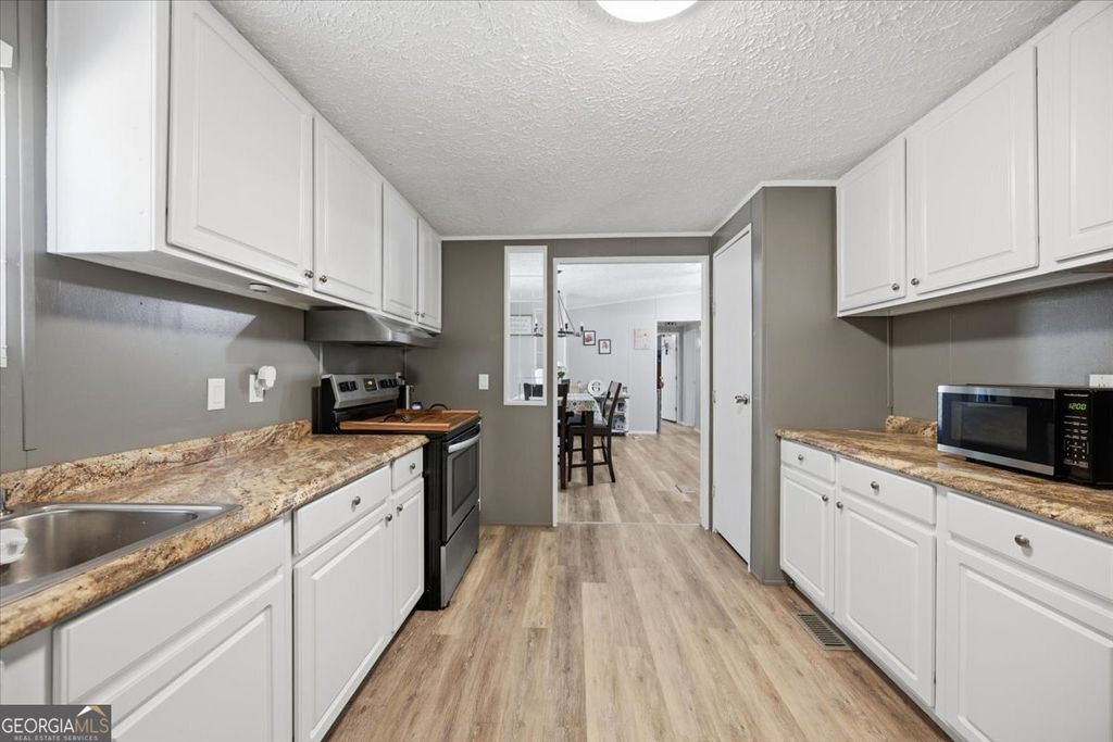 Photo of 224 Blounts Chapel Road, Haddock, GA 31033 (MLS # 10741249)