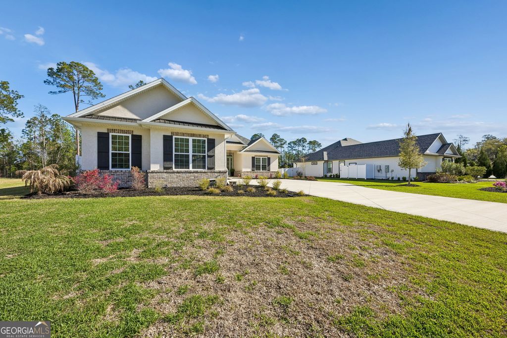 Photo of 204 Fiddlers Cove Drive, Kingsland, GA 31548 (MLS # 10713063)