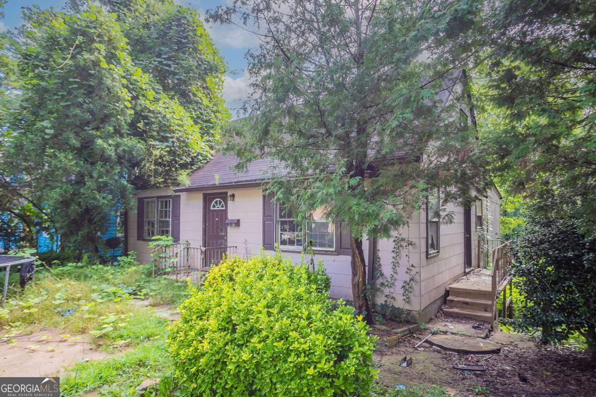 This 4-bedroom, 2-bath home in the established Forest Acres community offers a solid investment opportunity. While updates and renovations are needed, the home's location near schools, shopping, and major highways makes it an excellent candidate for fix-and-flip or long-term rental. Don't miss your chance to add value in a desirable and growing East Point neighborhood.
