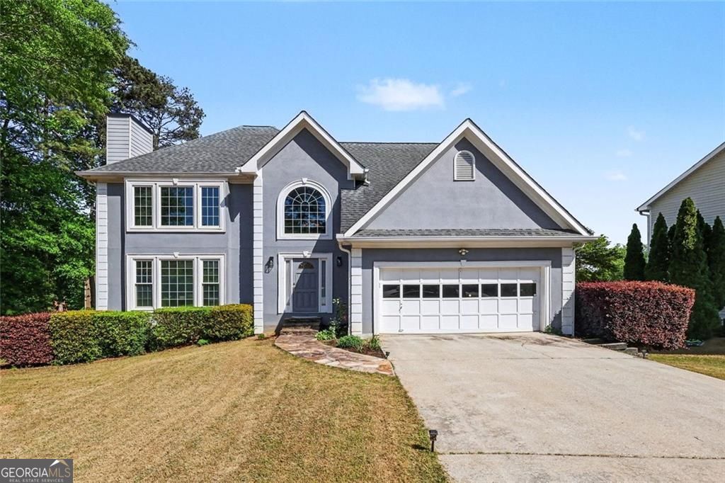 Photo of 2120 Thorndale Drive SW, Lilburn, GA 30047 (MLS # 10734715)