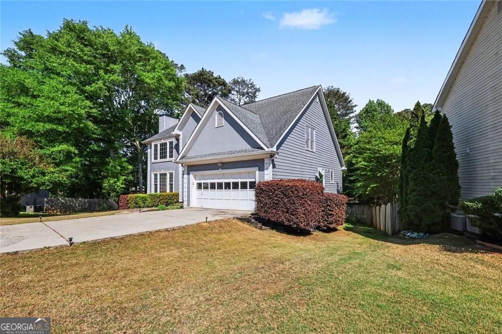 Photo of 2120 Thorndale Drive SW, Lilburn, GA 30047 (MLS # 10734715)