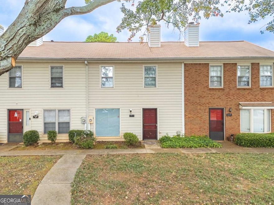 RARE FIND - AFFORDABLE TOWNHOME IN PRIME ROSWELL LOCATION! Discover this charming, fully remodeled townhome offering exceptional value and convenience. Move right in and enjoy a bright open floor plan featuring a modern kitchen, new flooring throughout the main level, fresh paint, and updated fixtures. The upper level includes two spacious bedroom suites, each with its own full bathroom, providing comfort and privacy. Enjoy low-maintenance living with a 2-car rear-entry carport in a peaceful, well-maintained community. Ideally located in the heart of Roswell-just minutes to restaurants, cafes, shops, top-rated schools, and easy access to GA-400. No rental restrictions - perfect for both investors and homeowners!