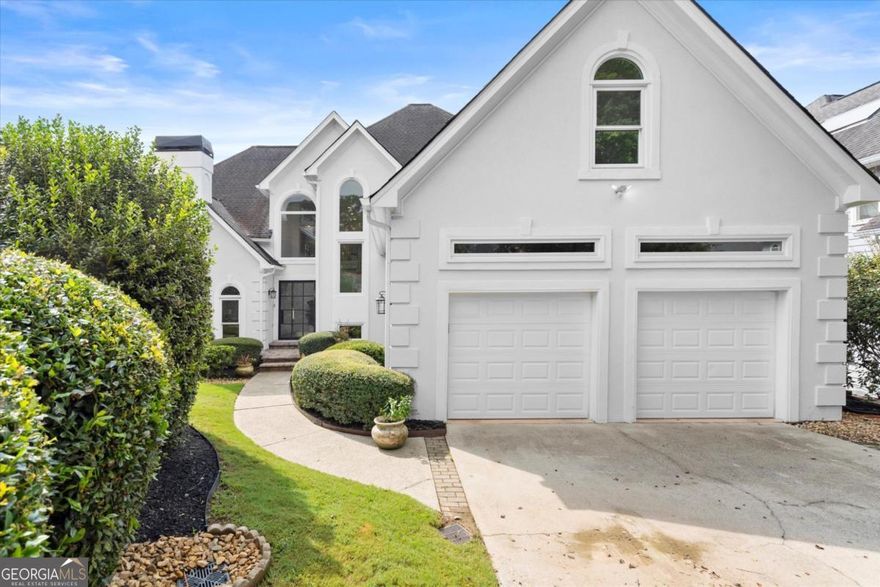 LOCATION! LOCATION! LOCATION!  Discover refined living in the heart of East Cobb with this beautifully renovated home, ideally situated on a quiet cul-de-sac in Chattahoochee Plantation, part of the prestigious Atlanta Country Club Estates. Known for its elegance, tranquility, and top-rated schools, this residence offers the very best of East Cobb living.  Step inside to find a thoughtfully curated renovation completed within the past year, featuring:    A striking custom iron front door  All-new energy-efficient double-paned windows  Fresh interior and exterior paint  A fully renovated chef's kitchen with an expansive island, new countertops, and designer backsplash  Beautifully updated upstairs bathrooms and laundry area  The primary suite on the main level provides convenience and privacy, enhanced by abundant natural light, spacious walk-in closets, and gorgeous hardwood flooring throughout - no carpet anywhere!  The finished daylight basement offers exceptional flexibility with a bedroom, full bath, gym area, and multiple spaces for entertaining, working, or relaxing.    Enjoy the luxury of walking to Atlanta Country Club while being zoned for East Cobb's award-winning schools: Sope Creek Elementary, Dickerson Middle, and Walton High School.    This rare opportunity blends luxury, location, and lifestyle - a home you won't want to miss!