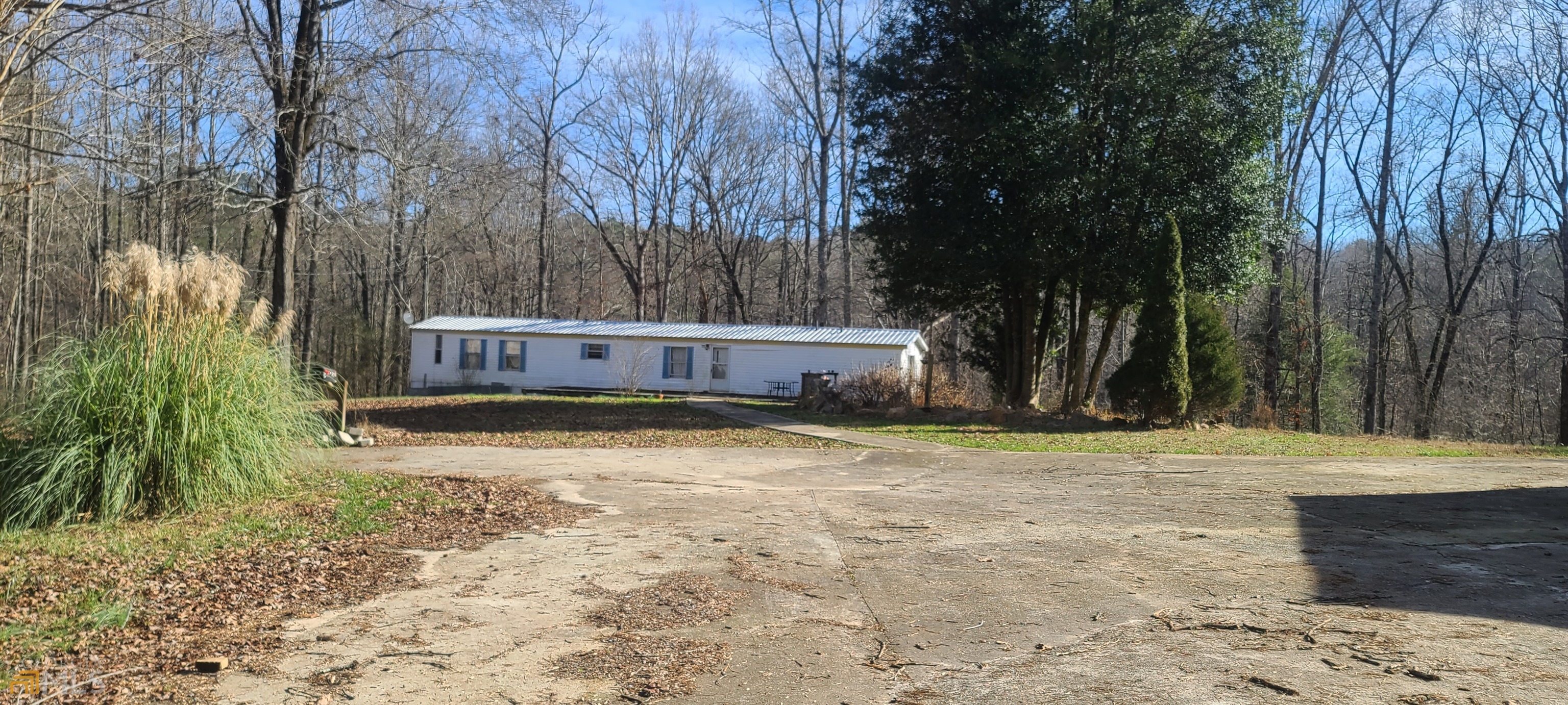 LOOKING FOR A AN INVESTMENT/RENTAL PROPERTY? LOOK NO MORE. SINGLE WIDE MOBILE HOME ON 3.30 ACRES. ACREAGE IS COMPRISED OF TWO LOTS. MOBILE HOME ITSELF IS SITUATED ON LOT 31 CONTAINING 2.13 ACRES. LEAVING THE REMAINING ACREAGE OF 1.17 ON LOT 30 WHICH HAS A 27X30 GARAGE/STRUCTURE THAT WILL ALSO NEED SOME REPAIRS. NO VALUE HAS BEEN GIVEN TO MOBILE DUE TO REPAIRS NEEDED THAT SELLER CAN NOT DO BECAUSE OF TIME CONSTRAINS. LAND LAYS WELL WITH A CREEK ON THE BACK BOUNDARY OF PROPERTY. DEADLINE TO SUBMIT OFFERS IS 01/15 @ 1PM.