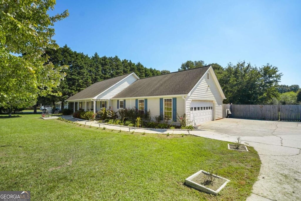 Photo of 3580 Marce Camp Road, Loganville, GA 30052 (MLS # 10870704)