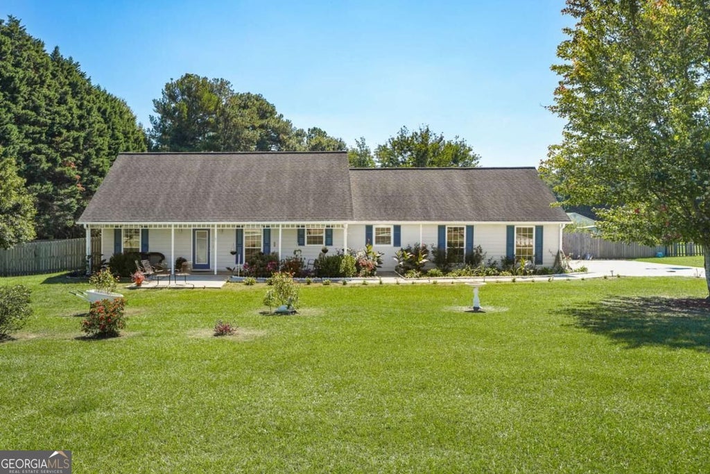 Photo of 3580 Marce Camp Road, Loganville, GA 30052 (MLS # 10870704)