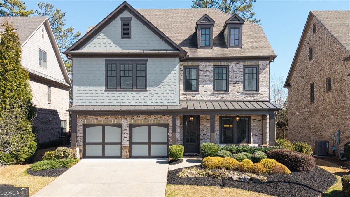 Live TALL in the sought after East Cobb Cobblestone Manor swim and tennis community, located in the premier school district of Walton High School. Welcome to this meticulously maintained, freshly painted, move-in ready home with the In-Law Suite on the main level. Situated on one of the freshly landscaped lots in the community, this home provides plenty of open living spaces for comfortable living, including multiple living areas. The living room with fireplace and gorgeous built ins and plenty of streaming light is an exceptional space. The heart of the home features a large gourmet kitchen complete with modern appliances, an abundance of cabinetry and an oversized island with a spacious breakfast dining area. This is the perfect open floor plan for entertaining guests. A cozy porch and grilling deck, overlooking the private backyard which offers plenty of room; this porch is a perfect space to relax year round. The owner's suite on the second level features a spacious layout with sitting area. The owner's bath is impressive with plenty of cabinetry and counter space along with the spa tub and oversized shower with glass doors. Conveniently located adjacent to the ownerCOs suite bath area, you will appreciate the generously-sized walk-in closet with custom built-in's. On the second level, the home features three well-designed en suite bedrooms with walk-in closet and their own private baths. Enjoy the community's exceptional tennis and pool amenities. Located in a prime East Cobb area with easy access to major highways, including 400, 285 and 75, along with numerous shopping and dining options. Your new lifestyle awaits in this exceptional community. Schedule your showing today! WILL BICKELHAUP WITH CAPITAL MORTGAGE SOLUTIONS IS OFFERING UP TO 1% OF THE LOAN AMOUNT FOR A TEMPORARY RATE BUYDOWN OR CLOSING CREDITS FOR THIS HOME WHEN FINANCED WITH HIM! CALL/TEXT WILL @ 404-630-7243.