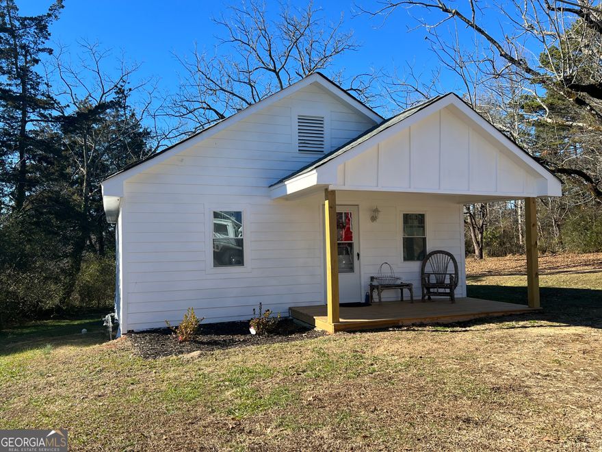 FARMHOUSE COTTAGE!!  This quaint cottage has recently underwent renovation and ready for the next generation to make their memories.  Renovations include:  NEW WINDOWS, NEW HVAC, CEILING FANS, NEW PRE-FINISHED FLOORING, NEW BATHROOM FIXTURES AND FINISHES, NEW OVEN, BARN DOOR, CONCRETE SIDING, NEW ROOF, NEW DECK and NEW PRIVACY FENCE! With 2 bedrooms and 1 bath, it's the perfect starter home or retirement home.  The home sits on a 1 acre lot with private back yard.    Such a great home and rare find.  Quick and convenient access to Hwy 365 and 441, it's a commuters dream!  Don't delay schedule your showing today!!!