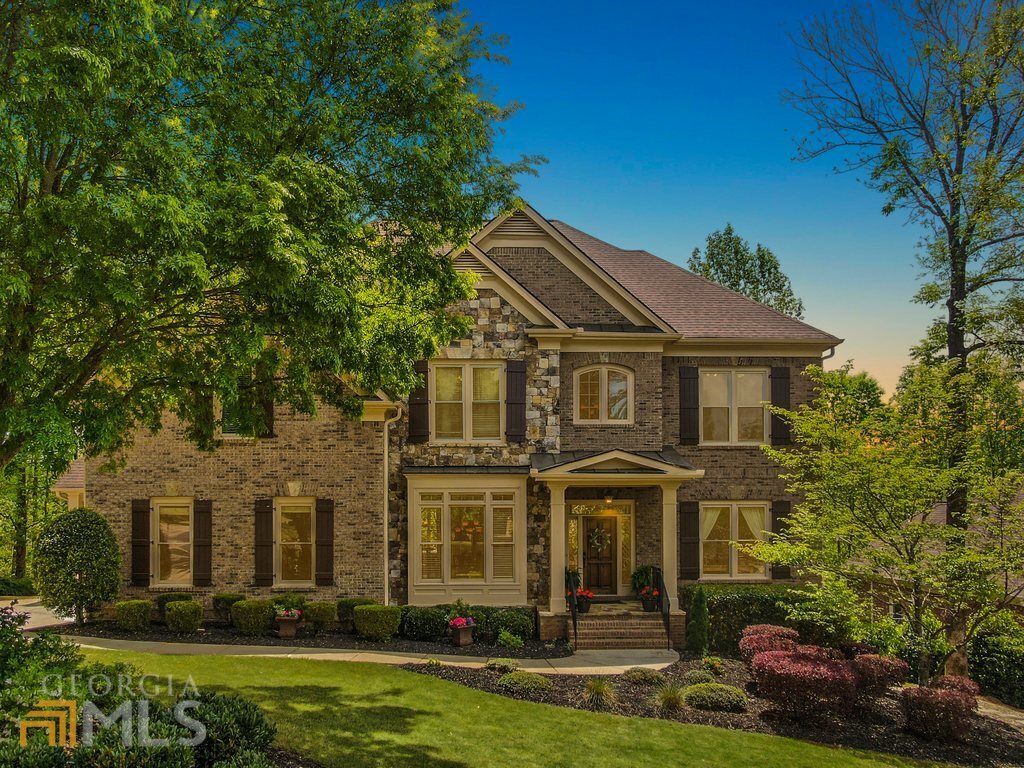 Spectacular four-sided brick beauty in Bears Best gated community. Beautiful hardwood floors lead through this spacious main level that offers a two-story well lit living room and into the open kitchen with fireside keeping area and built-ins. Terrace level is a home on its own with a granite and stainless steel kitchen, bedroom and full bathroom. Walk outside to the fenced in backyard and oversized Jacuzzi. This amazing home also has a composite deck, deck lighting ,dual shower in owner's suite, super-bright bedrooms on upper level, oversized ownerCOs suite with sitting area and fireplace, large upstairs laundry room, radon mitigation system on the lower level and so much more!
