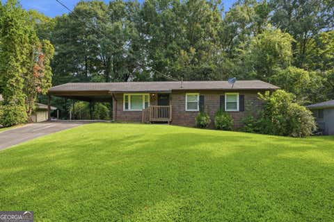 Photo of 928 Magna Carta Drive NW, Atlanta, GA 30318 (MLS # 10825273)