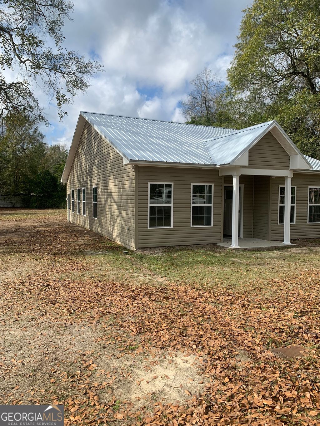 Photo of 267 Saunders Street S, Pelham, GA 31779 (MLS # 10670019)