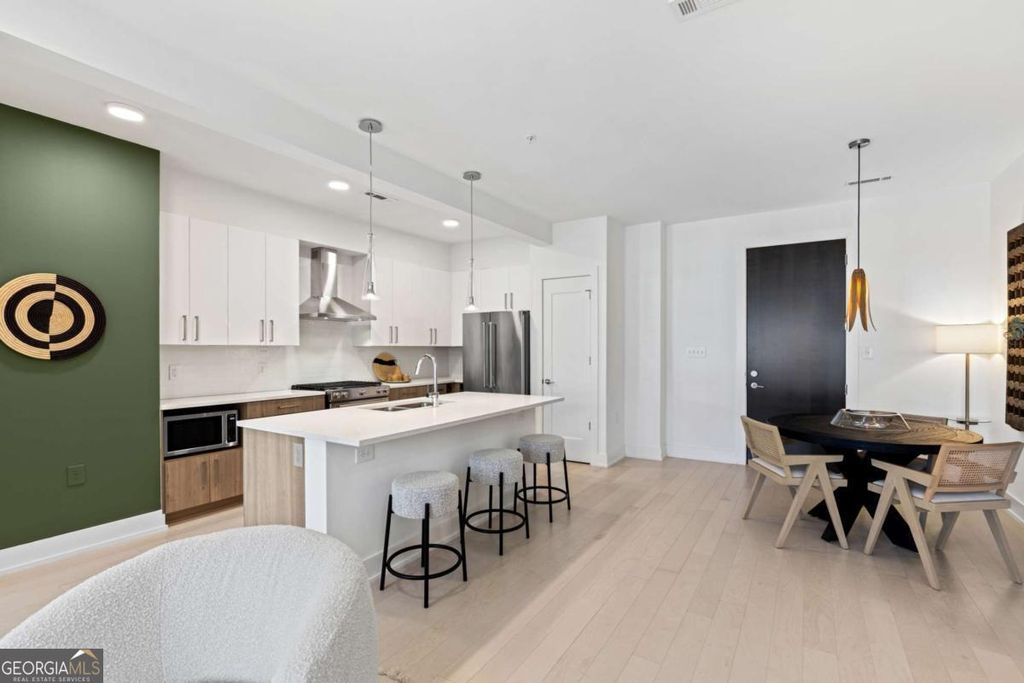 Photo of 775 Juniper Street NE #227, Atlanta, GA 30308 (MLS # 10679788)