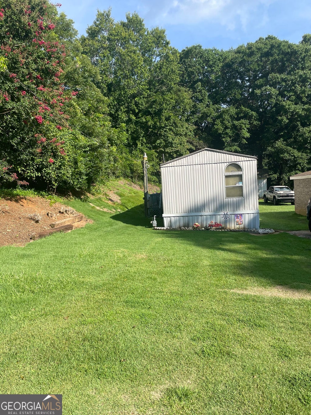 Photo of 5911 Church Street, Flowery Branch, GA 30542 (MLS # 10821989)