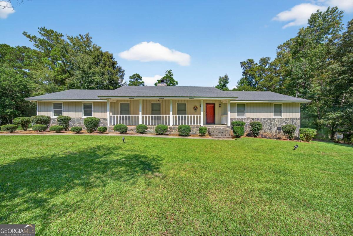 Country Club Estates is THE hotspot right now for buyers! This home features FIVE bedrooms and two full baths, two living spaces, a dining room, and an eat-in kitchen with a newer refrigerator and gas stove. The sunroom is bright and airy and overlooks a large back yard with a salt water pool. It's a perfect way to enjoy these hot temps of July and August! You've not experienced neighborhood fun until you experience the fall fun and the luminaries in December. The Club at Lake Sinclair is located just down the street and provides a top notch restaurant that's open to the public and well as various events for club members. Don't miss this opportunity to live in a great location at an affordable price!