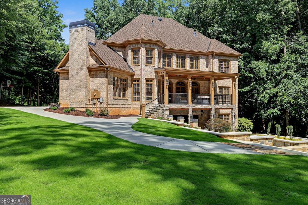 Photo of 2730 Manor Bridge Dr, Milton, GA 30004 (MLS # 10808432)