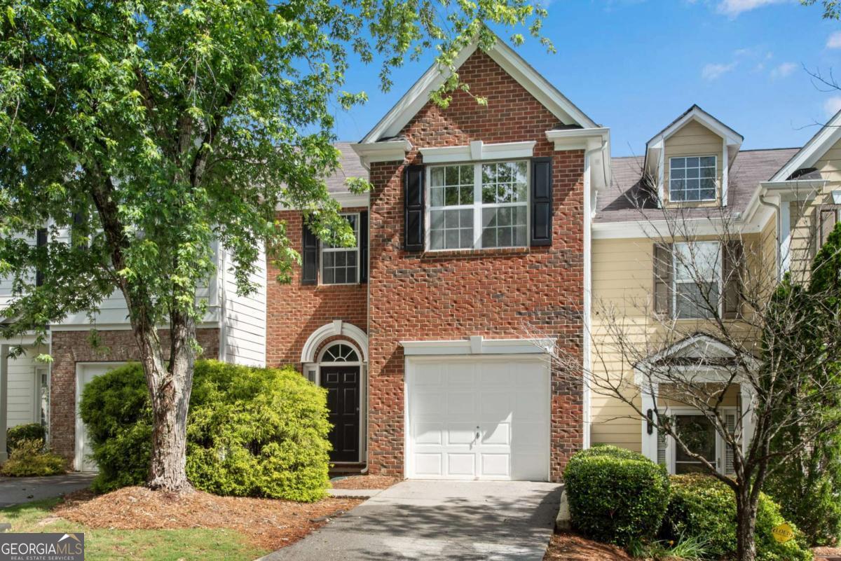 Stunning, Fully Renovated Townhome Just Minutes from Downtown Woodstock! This completely move-in ready home has been thoughtfully updated from top to bottom! The kitchen and bathrooms have been completely gutted and transformed into beautiful, modern spaces with stainless steel appliances and timeless design. You'll love the open-concept main level, perfect for entertaining or everyday living. Features include fresh interior and exterior paint, new bathroom vanities, stylish light fixtures and ceiling fans, the roof has brand-new roof boots for peace of mind and a New Furnace! The home offers 3 spacious bedrooms PLUS a loft, ideal for a home office or play area. Enjoy the unbeatable location: walkable to Downtown Woodstock, close to I-575, KSU, and the Outlet Shoppes. With a low monthly HOA, this gem won't last long schedule your showing today!