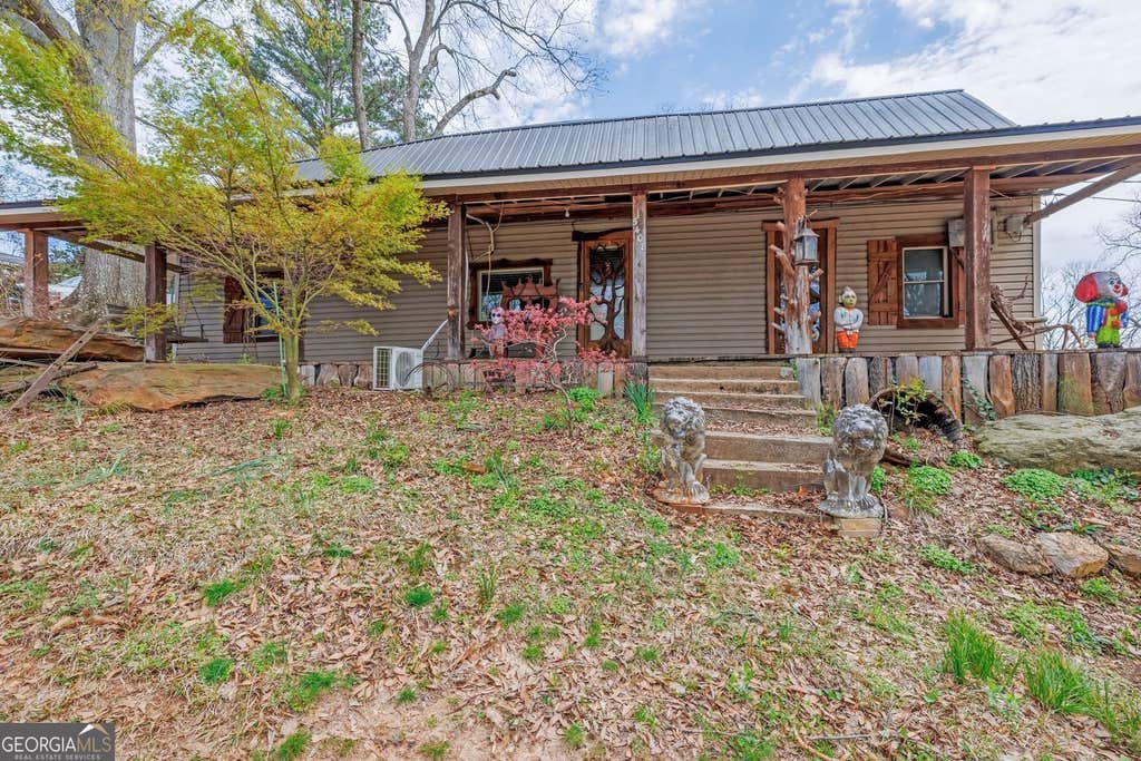 Photo of 5408 Spring Street, Flowery Branch, GA 30542 (MLS # 10811237)