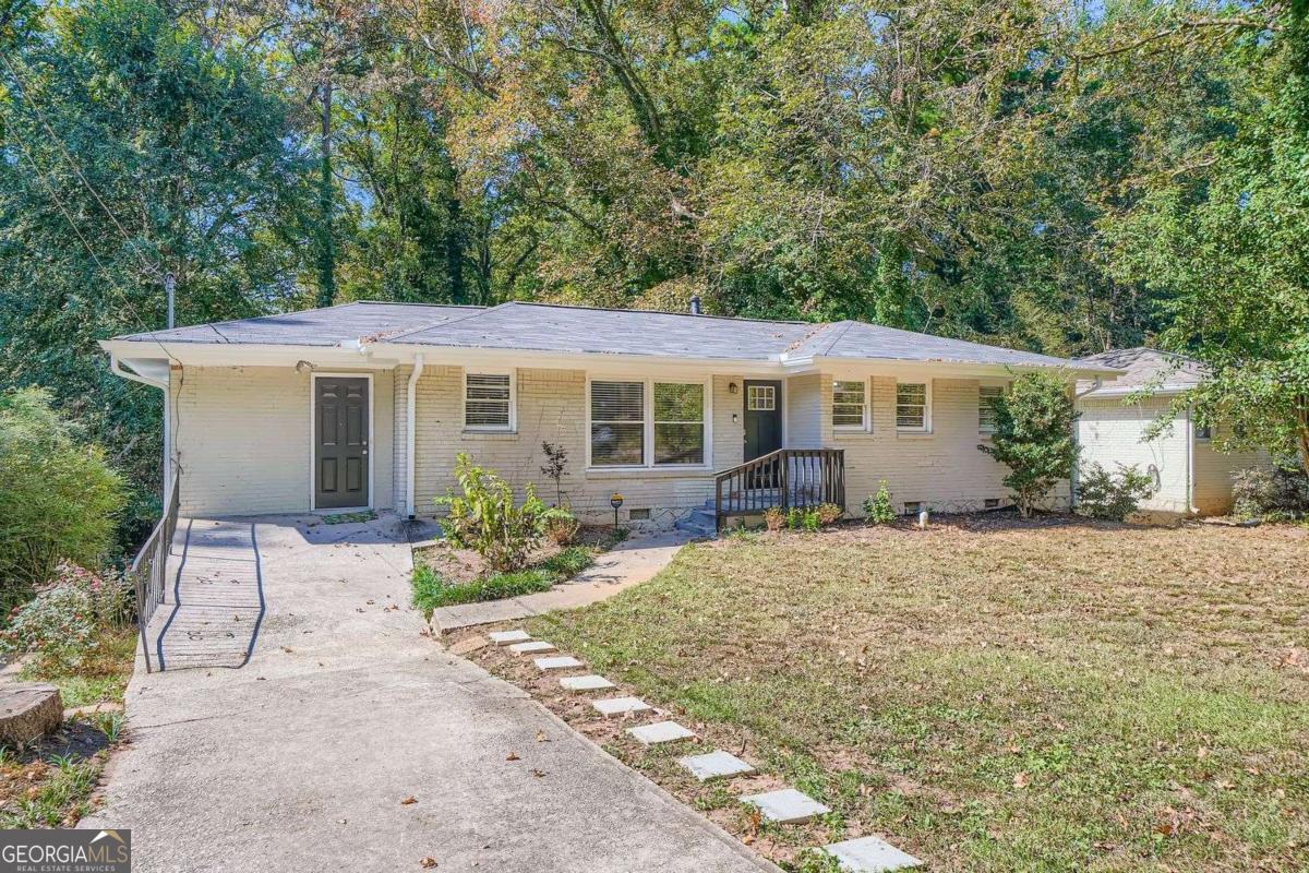 This is a sweet 3 bedroom 1.5 bath home on a large lot with TONS of extra space and great light. The living room has beautiful windows facing the large back yard. There is a formal dining room and lots of closets. The large family room is a second living space, currently a large craft room, and has a private back deck. Below the family room is a semi-finished basement room with a side door and picture window which would be a great workshop, art room, or den space. The HUGE full basement has very tall ceilings and numerous windows. The kitchen and bathrooms are renovated. Also the seller has put a good deal of work into the house upgrading some of the essential but non flashy stuff like the electrical system and the soffits. There is just something very welcoming and cheery about this property.