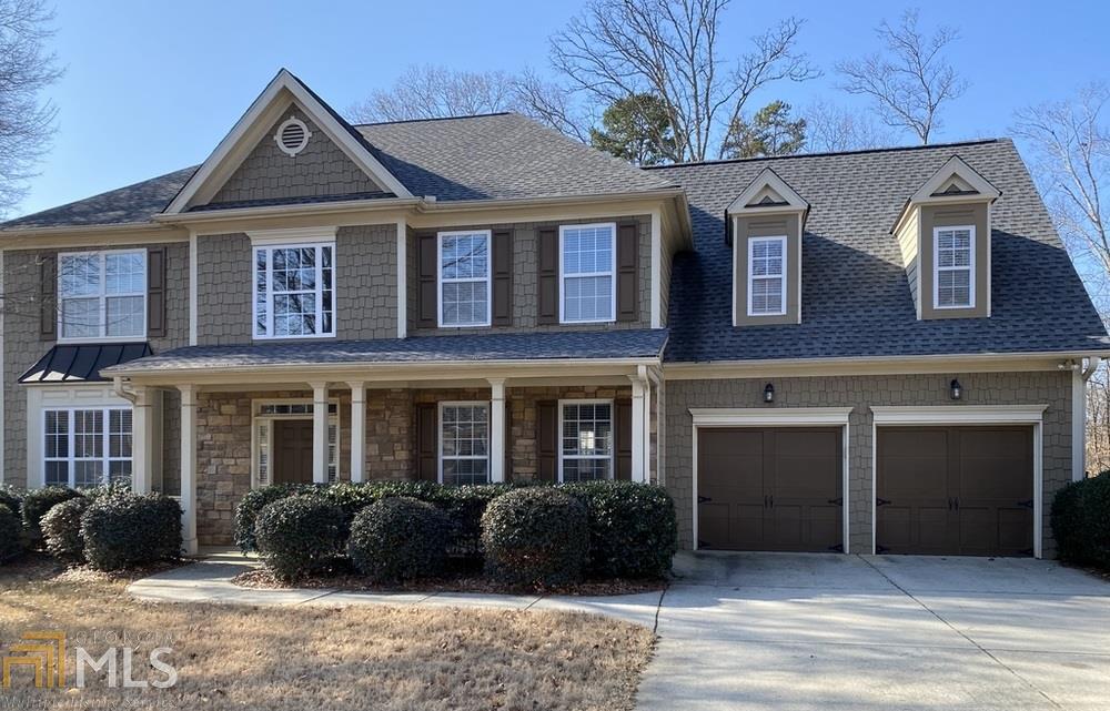 AMAZING SOUTH FORSYTH HOME ON 1/2 ACRE LOT! Inviting front porch; Light filled home with two story foyer; Great open floor plan; Bedroom on main; Office or 5th bedroom; Upstairs master suite; Four full baths; Kitchen has stainless and white cabinets & opens to a large eating area & two story great room; High quality engineered hardwoods; New carpet with lifetime warranty; Roof new in 2018; Large private backyard with extended side yard.