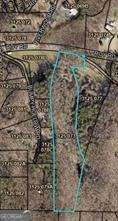 Nestled in the scenic heart of Ellijay, GA, this stunning 17.99-acre property offers a tranquil retreat with endless potential. A picturesque creek meanders along the left side, providing a peaceful backdrop to the hardwoods that blanket the landscape. With multiple ideal building sites and approximately 2 acres cleared at the front, the possibilities for development are abundant-whether you envision Airbnb rentals or a private getaway. The property features a 1-bedroom, 1-bath home, which could be renovated or removed to create additional space. Equipped with a spring-fed water system, septic tank and rebuild concrete bridge it's primed for your vision. Just a 10-minute drive to shopping, dining, and easy access to I-515, and only 13 minutes from the charming downtown Ellijay, this property offers the perfect blend of seclusion and convenience. A rare opportunity to create your dream escape in a serene and sought-after setting!