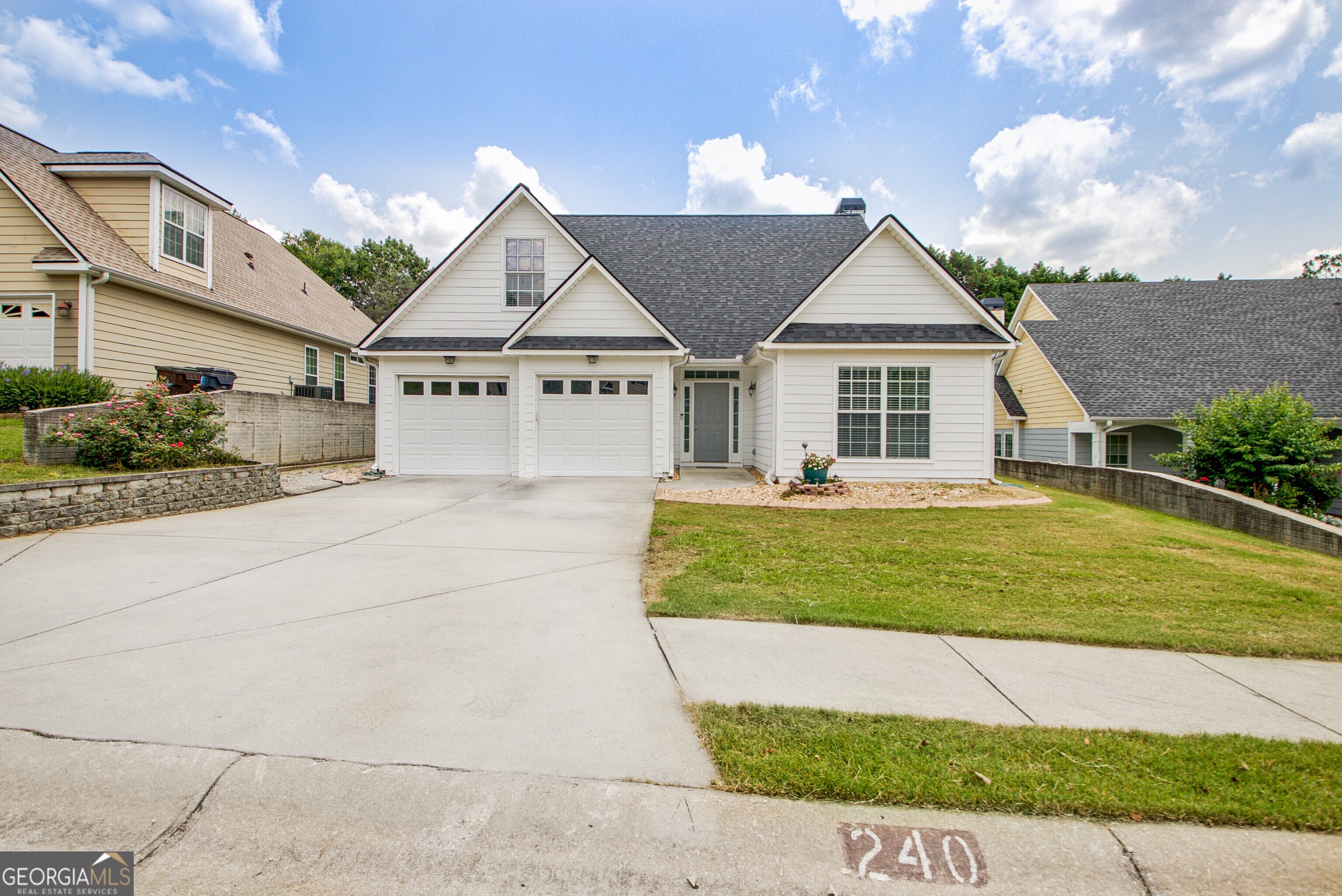 New and improved with brand new carpets! In one of Peachtree City's most sought-after neighborhoods, this charming 4-bedroom, 2-bathroom home offers comfort, style, and convenience in one beautifully maintained package. Step inside and be greeted by a vaulted living room that flows seamlessly into an open-concept kitchen, featuring newer stainless steel appliances that make cooking a pleasure. The thoughtful layout is ideal for both everyday living and entertaining. The spacious master suite includes a tile shower and large walk-in closets, creating a peaceful sanctuary at the end of the day. Three additional bedrooms including one upstairs offers flexibility for family, guests, or a home office. Enjoy peace of mind with a 2-year-old roof. Step outside to a fully fenced backyard, perfect for pets, play, or relaxing under the Georgia sun. Don't miss your opportunity to own this well-cared-for home in a golf-cart friendly community, just minutes from top-rated schools, shopping, and the scenic paths Peachtree City is known for.